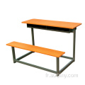 Bureau d'école double et chaise de banc attachés